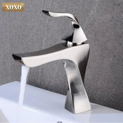 Modern matte black decorbites contemporary brass basin faucet with shiny chrome finish and sleek angular flowing spout