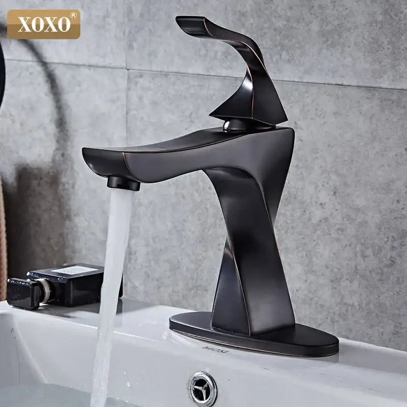 Modern matte black contemporary brass basin faucet with sleek angular design and curved spout by decorbites contemporary brass