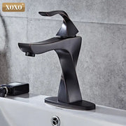 Modern matte black xoxo basin faucet with sleek angular contours in decorbites contemporary brass basin design
