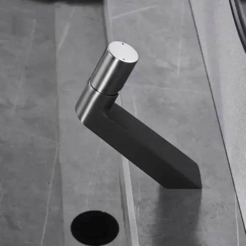 Modern brushed stainless steel decorbites basin faucet with sleek angular design for bathroom sink use