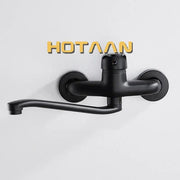Modern matte black dual hole kitchen faucet with a sleek curved spout and black matte finish decorbites dual hole design
