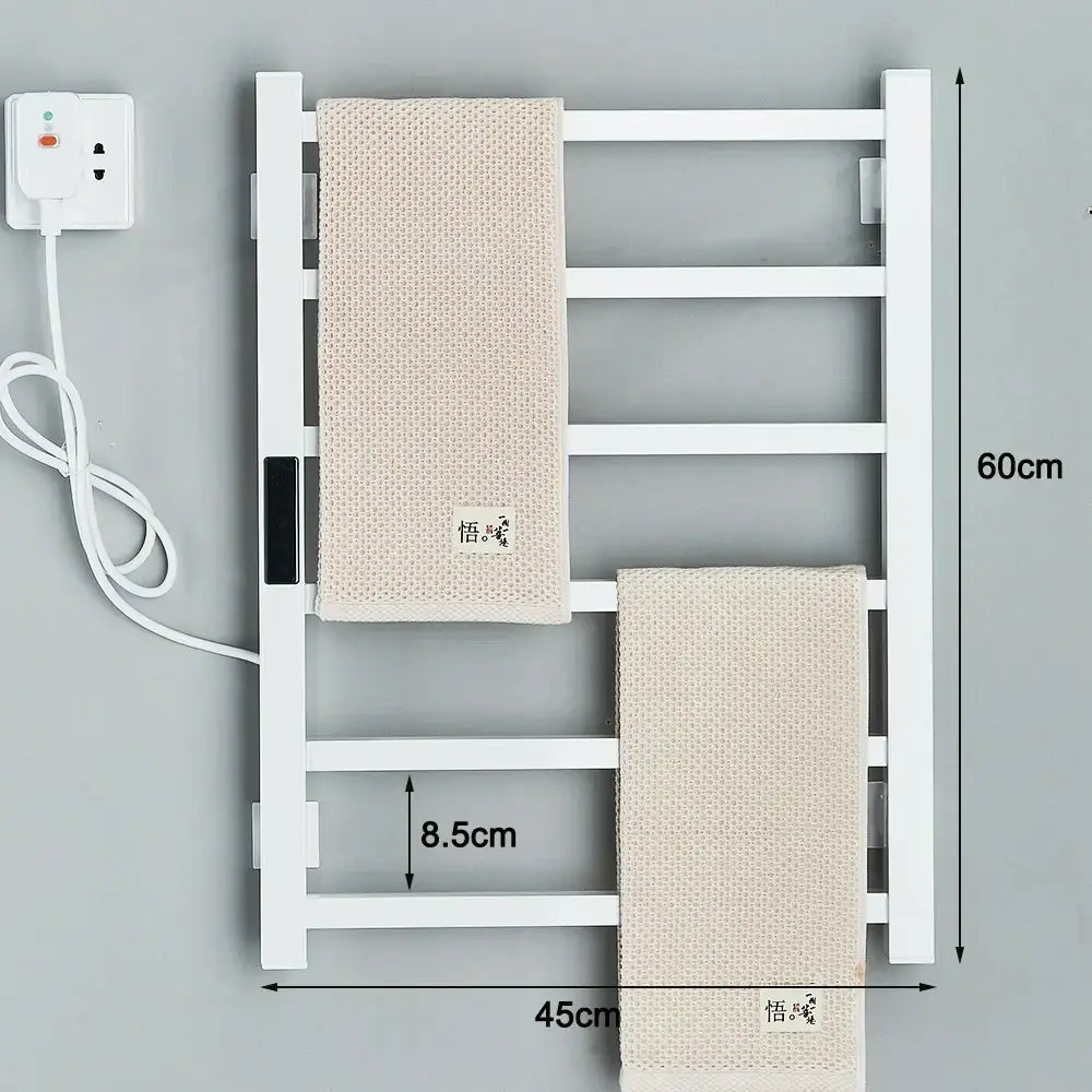Modern matte black electric towel warmer with digital display and white rack holding beige textured towels
