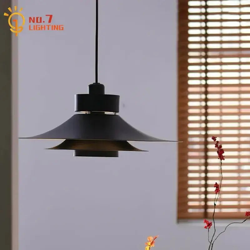 Modern flying saucer pendant light in matte black with layered conical shades for dining room decorbites modern flying