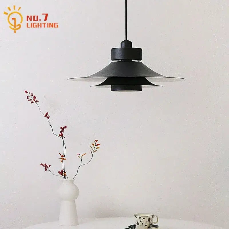 Black matte pendant light with layered flared design for modern flying saucer decorbites modern flying use