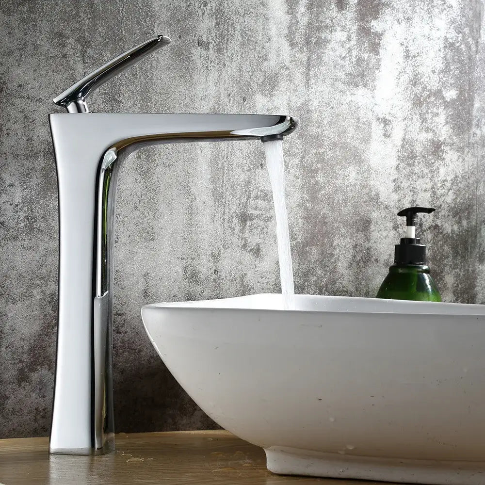 Chrome-finished modern waterfall basin faucet with sleek tall design by decorbites for stylish bathroom use
