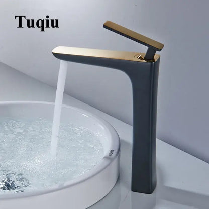 Modern matte black and gold decorbites basin faucet with sleek minimalist design for bathroom use