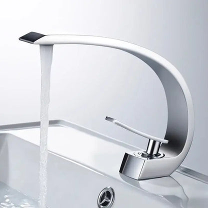 Modern chrome-finished basin faucet with sleek curved design and black accent for gold modern basin bathroom use