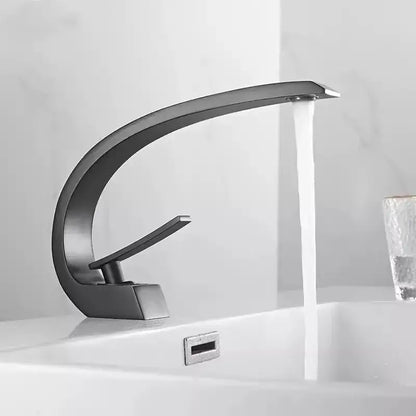 Modern matte black and gold modern basin faucet with sleek curved design and single lever handle for bathroom use