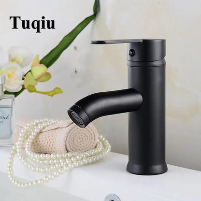 Modern matte black and gold single handle wash basin faucet with curved spout decorbites black single design