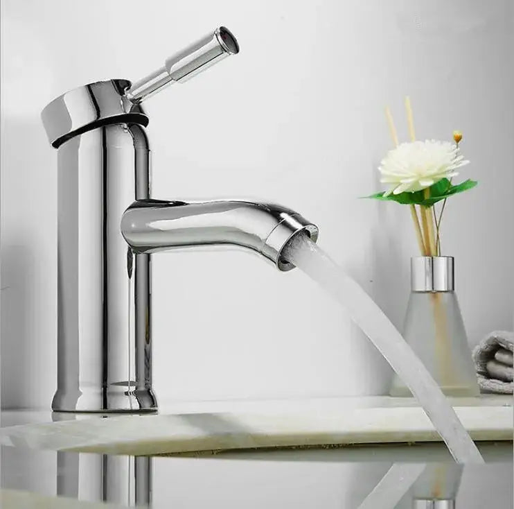 Modern matte black and gold single handle wash basin faucet with chrome finish and sleek curved spout by decorbites black single
