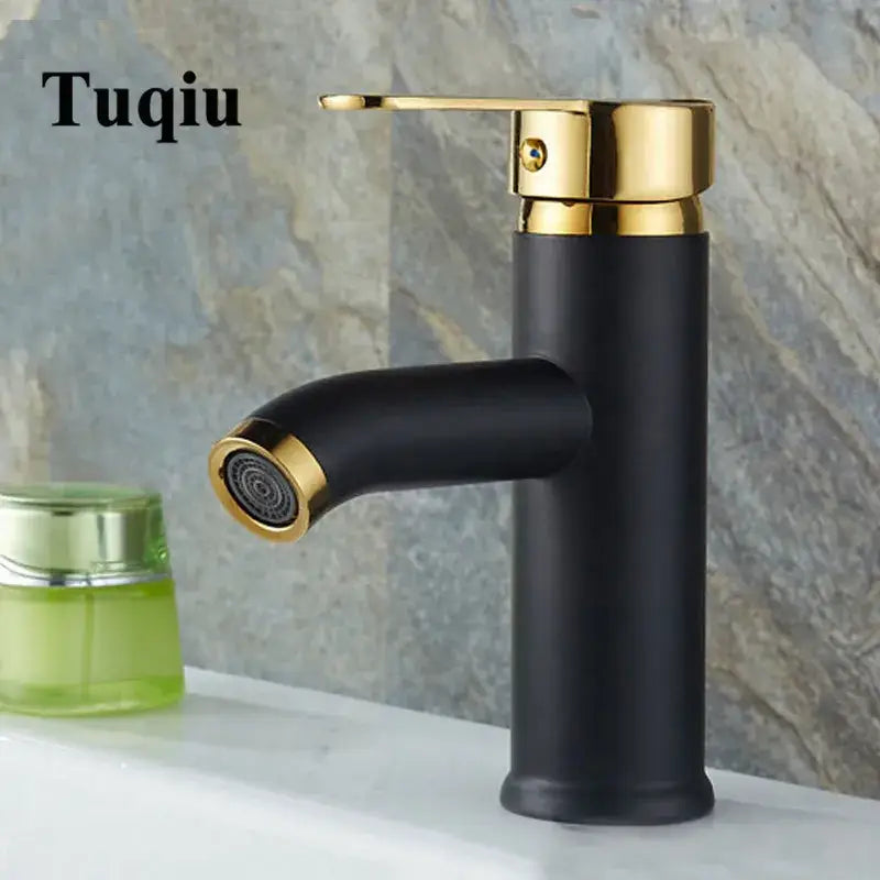 Modern matte black and gold single handle tuqiu bathroom faucet with polished brass accents for wash basin decorbites black single