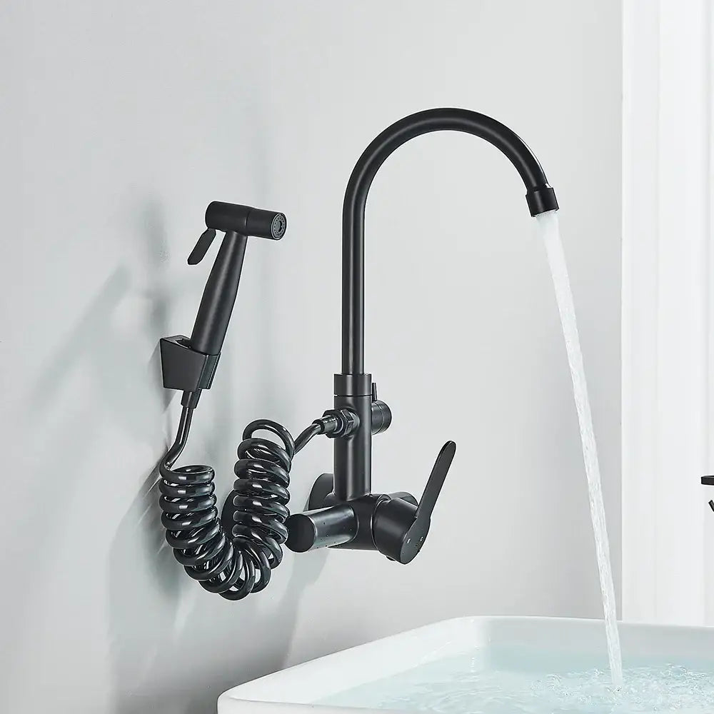 Modern matte black gourmet kitchen faucet with coiled hose and integrated extendable spray nozzle for kitchen faucet use