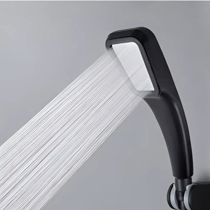 Modern matte black high pressure rainfall shower head with sleek rectangular design and smooth matte finish for bathroom use