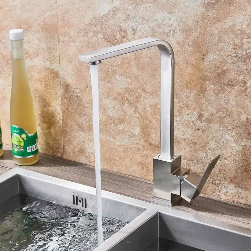 Modern matte black kitchen faucet with brushed nickel finish featuring a sleek high-arc spout decorbites brushed nickel