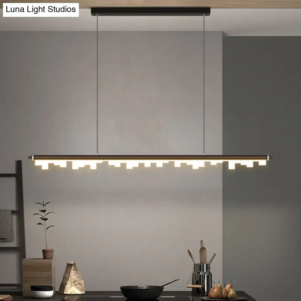 Modern matte black led island light with acrylic shade warm white and chain cord length featuring a stepped design
