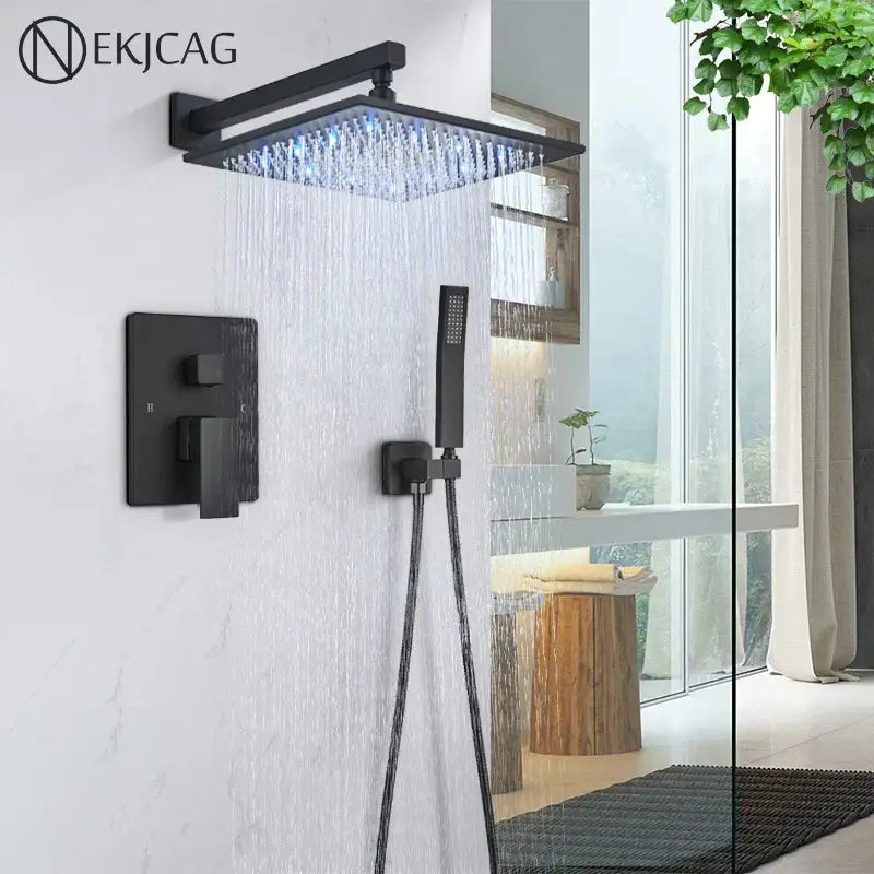Modern matte black led rainfall shower faucet set featuring a black matte rectangular rain shower head with blue led lighting
