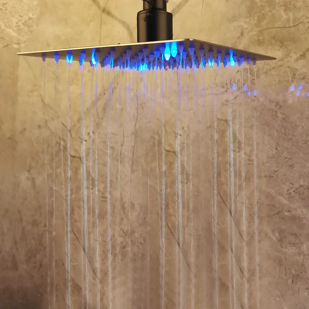 Modern matte black shower faucet set with square metallic showerhead and blue led lighting for bathroom rain head use
