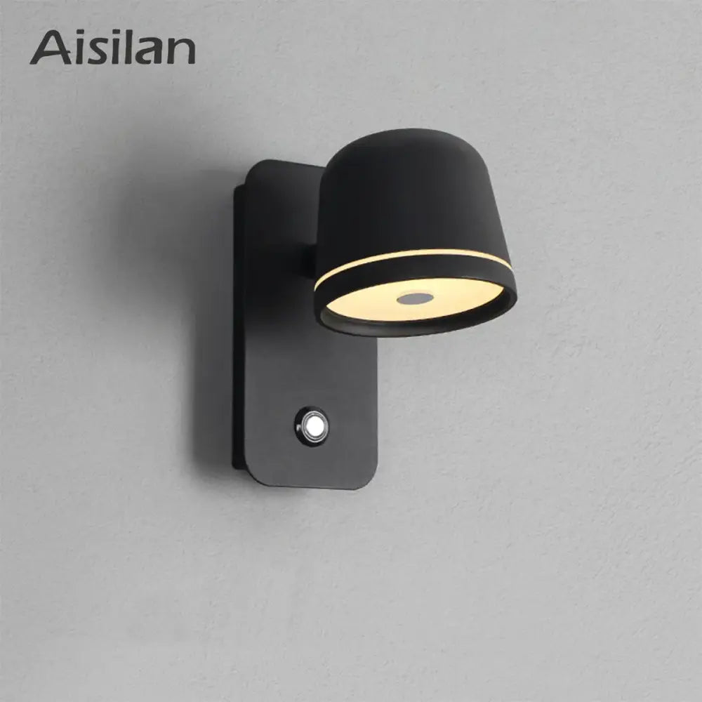 Modern matte black led wall lamp with adjustable spotlight and warm circular light output for bedroom decorbites led wall