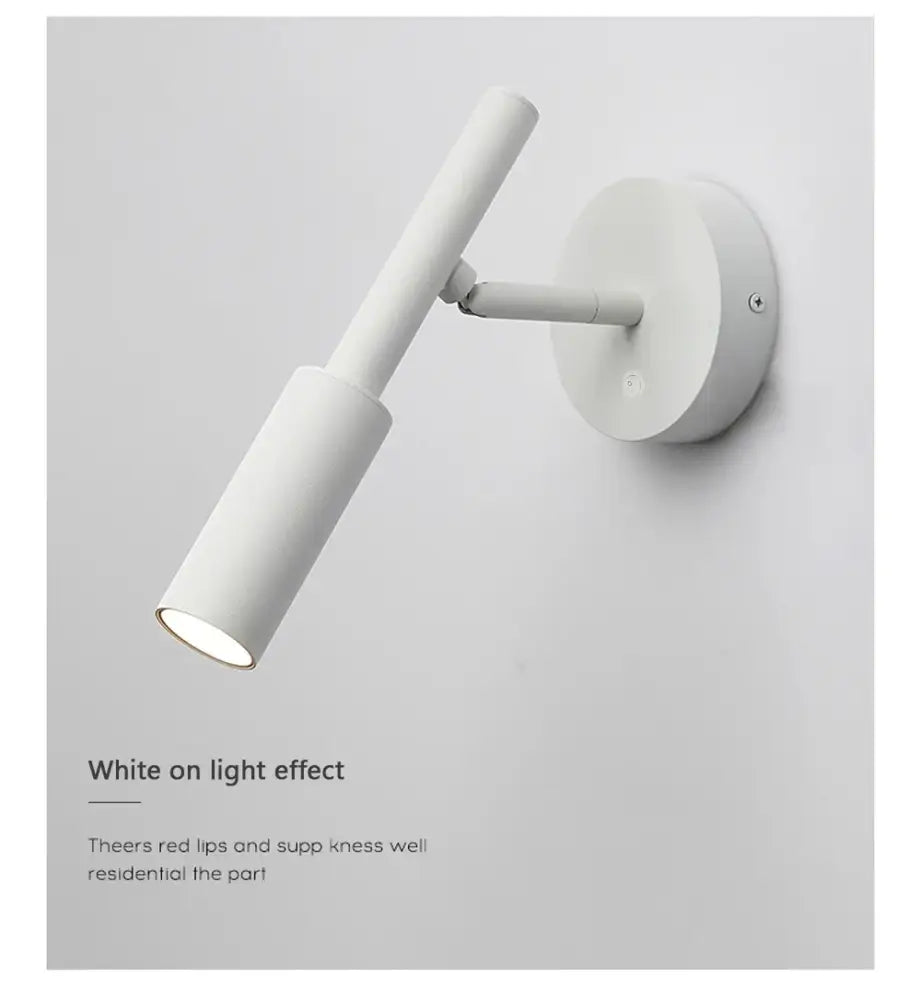 Modern matte black led wall lamp with a minimalist cylindrical design and adjustable arm for wall lamp reading in bedroom