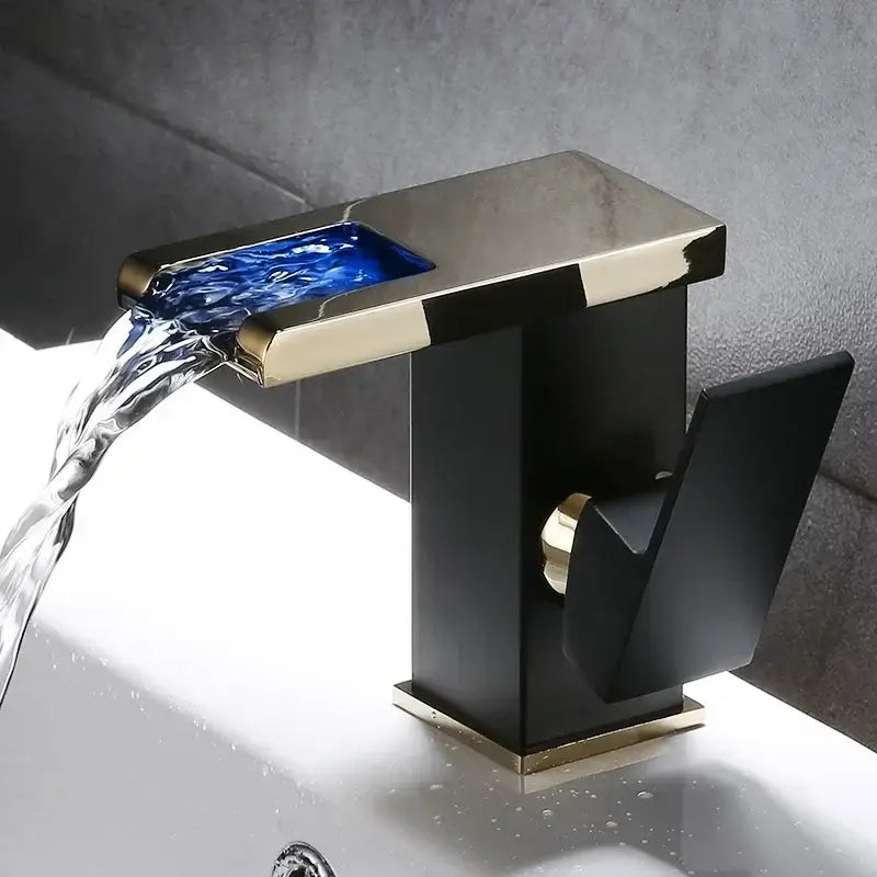 Modern matte black led waterfall basin faucet with gold accents and blue glass insert by decorbites led waterfall basin