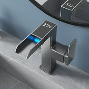 Modern matte black led waterfall basin faucet with digital temperature display and illuminated blue water flow indicator