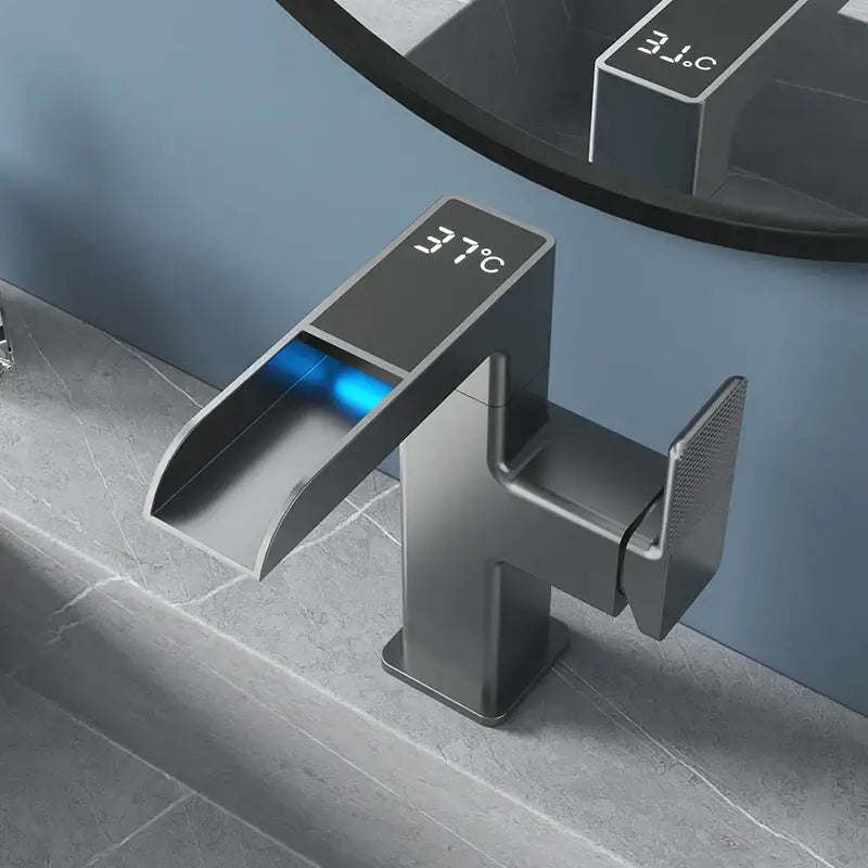 Modern matte black led waterfall basin faucet with digital temperature display and illuminated blue water flow indicator