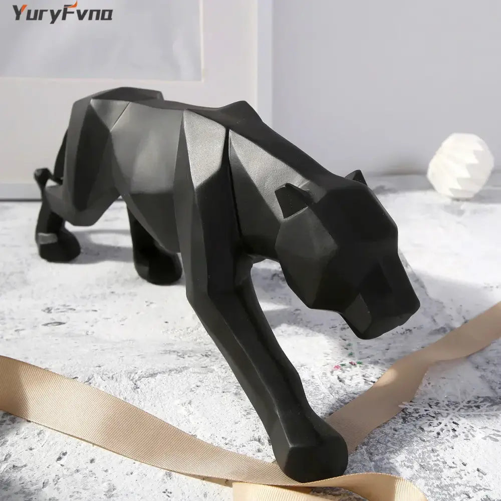 Modern matte black leopard geometric resin statue with angular faceted design for living room decorbites leopard geometric decor