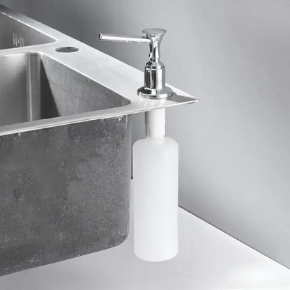Modern matte black liquid soap dispenser with chrome finish pump and sleek cylindrical white plastic bottle for kitchen use