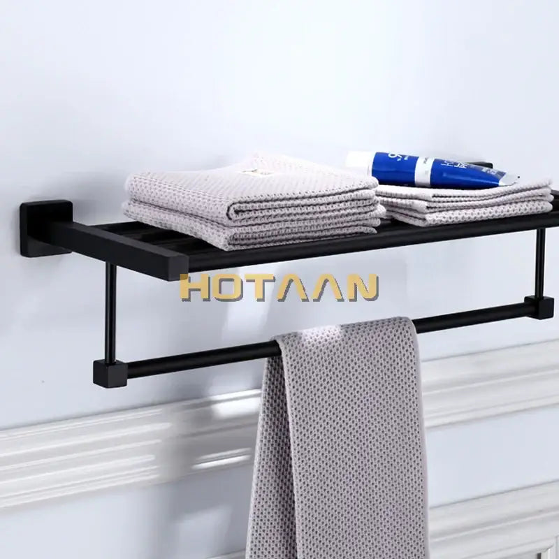 Modern matte black metal towel rack with sleek multi bar design for bathroom decorbites black towel use