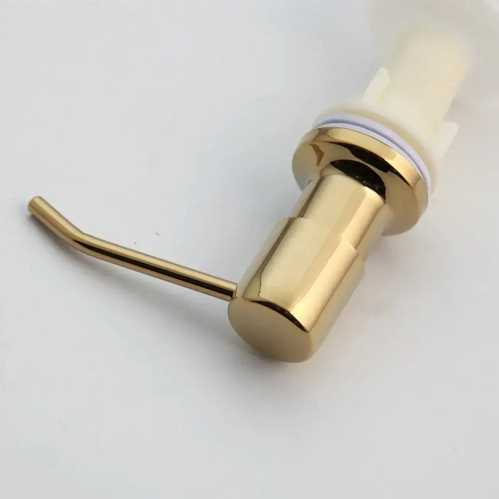 Modern matte black metal soap dispenser with gold finish and curved pump handle for liquid soap decorbites grey rose