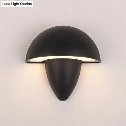 Modern matte black wall sconce with a sleek half-moon upper section and tapered base for led incandescent fluorescent use