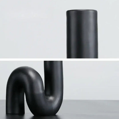 Modern matte black pipe geometric twist knot figurine made of ceramic with sleek u-shaped curve for living room decorbites decor