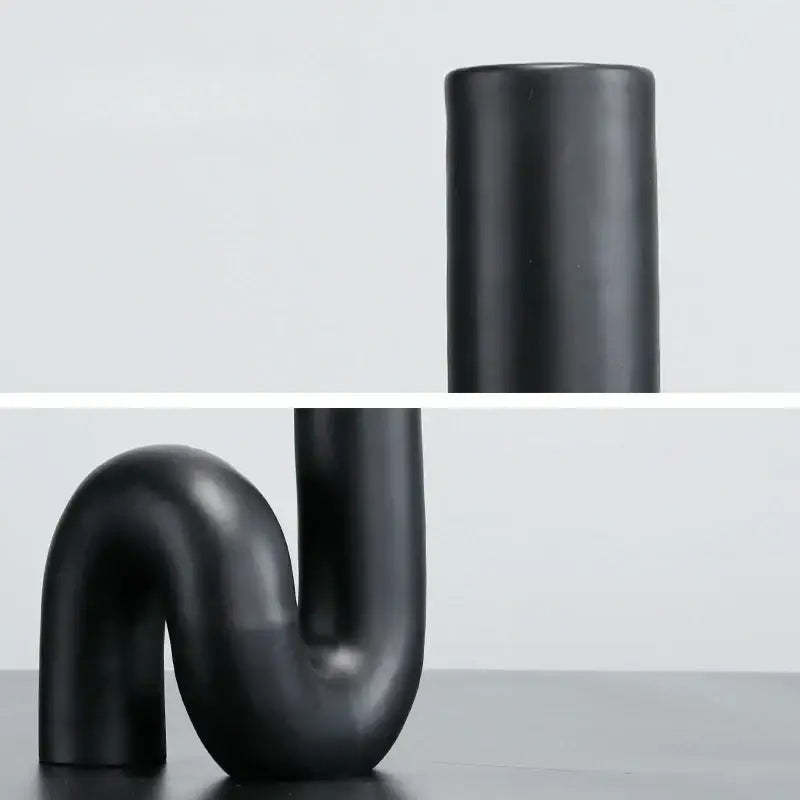 Modern matte black pipe geometric twist knot figurine made of ceramic with sleek u-shaped curve for living room decorbites decor
