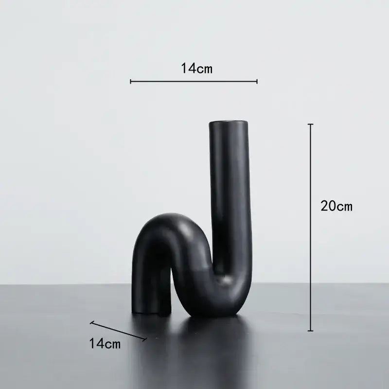 Black matte ceramic vase with sleek modern u-shaped twist knot design for decorbites black pipe geometric decor