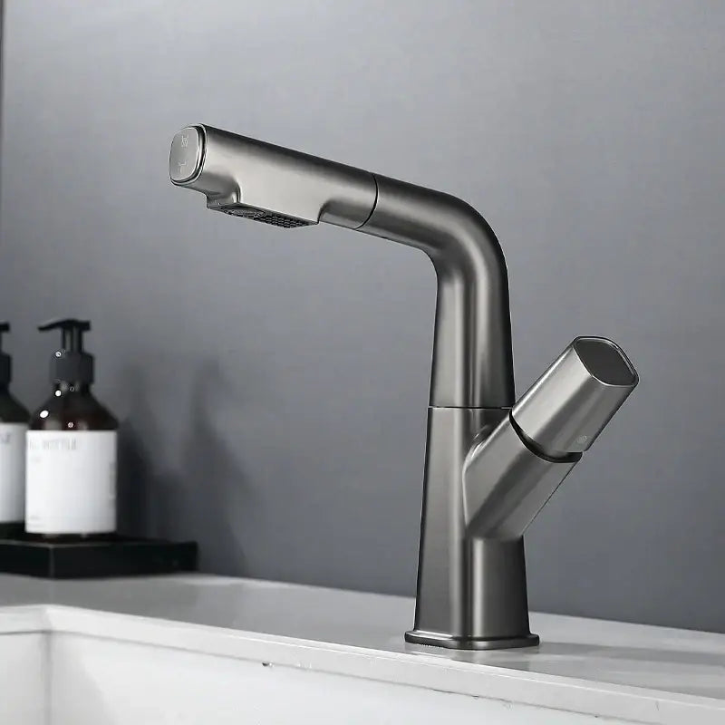 Modern matte black pull out brass basin faucet with sleek curved spout and integrated spray head for cold mixer use