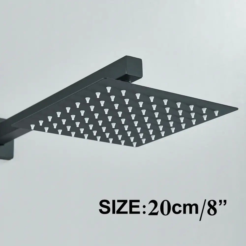 Modern matte black shower head set with a square rainfall shower head featuring multiple nozzles in a grid pattern