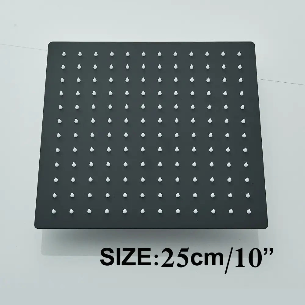Modern matte black shower head set with a square rainfall head and white nozzle grid for bathroom fixtures