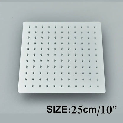 Modern matte black shower head set featuring a square white showerhead with evenly spaced rounded nozzles