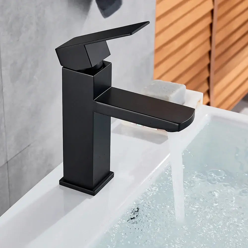 Modern matte black rectangular basin faucet with angular design and square base from decorbites basin faucet collection