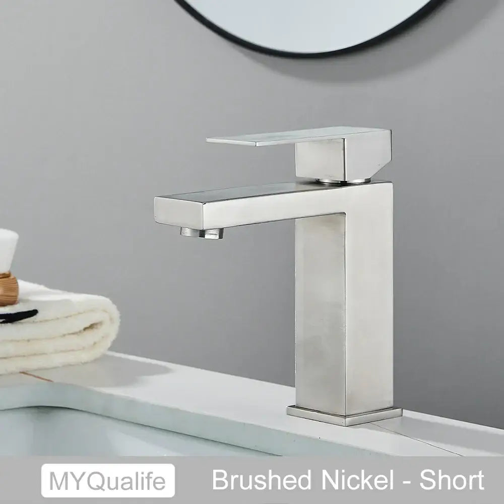 Modern matte black rectangular basin faucet mixer with a brushed nickel short bathroom faucet and flat spout design