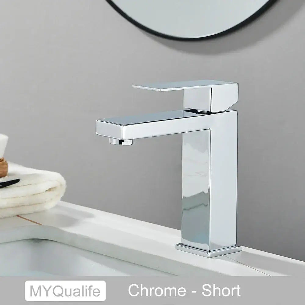 Modern chrome finished short single-handle basin faucet mixer with a rectangular design for bathroom use