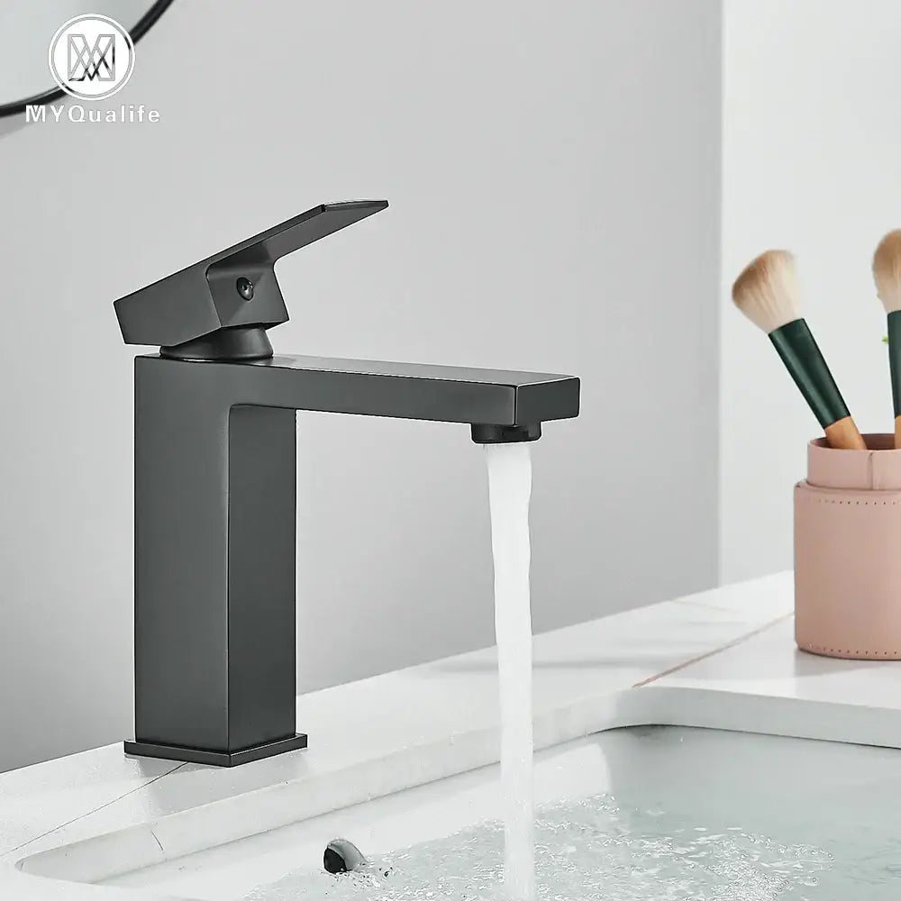 Modern matte black rectangular basin faucet mixer with a sleek matte finish and minimalist handle for bathroom use