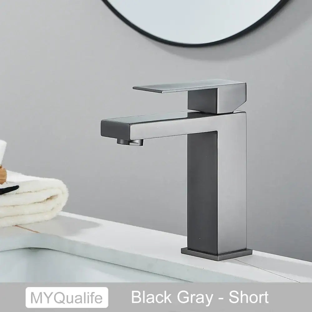 Modern matte black rectangular basin faucet mixer with sleek minimalist design and brushed metal finish for bathroom use