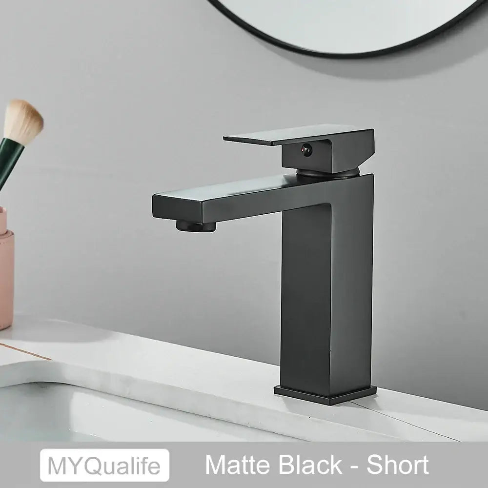 Modern matte black rectangular basin faucet mixer with short spout for contemporary bathroom use