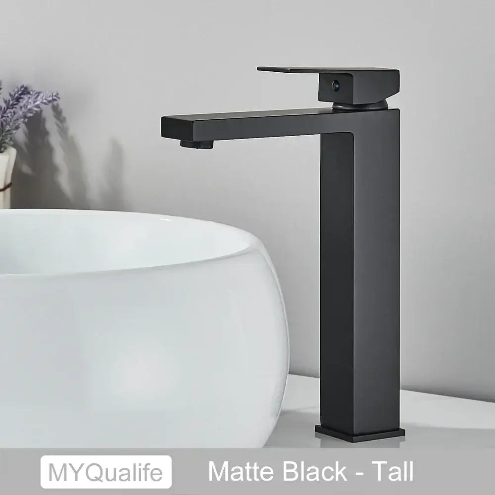 Modern matte black rectangular basin faucet mixer with a tall minimalist design for bathroom use