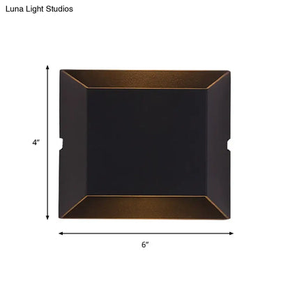 Modern matte black rectangular led wall sconce with matte black exterior and warm bronze interior for outdoor balcony use