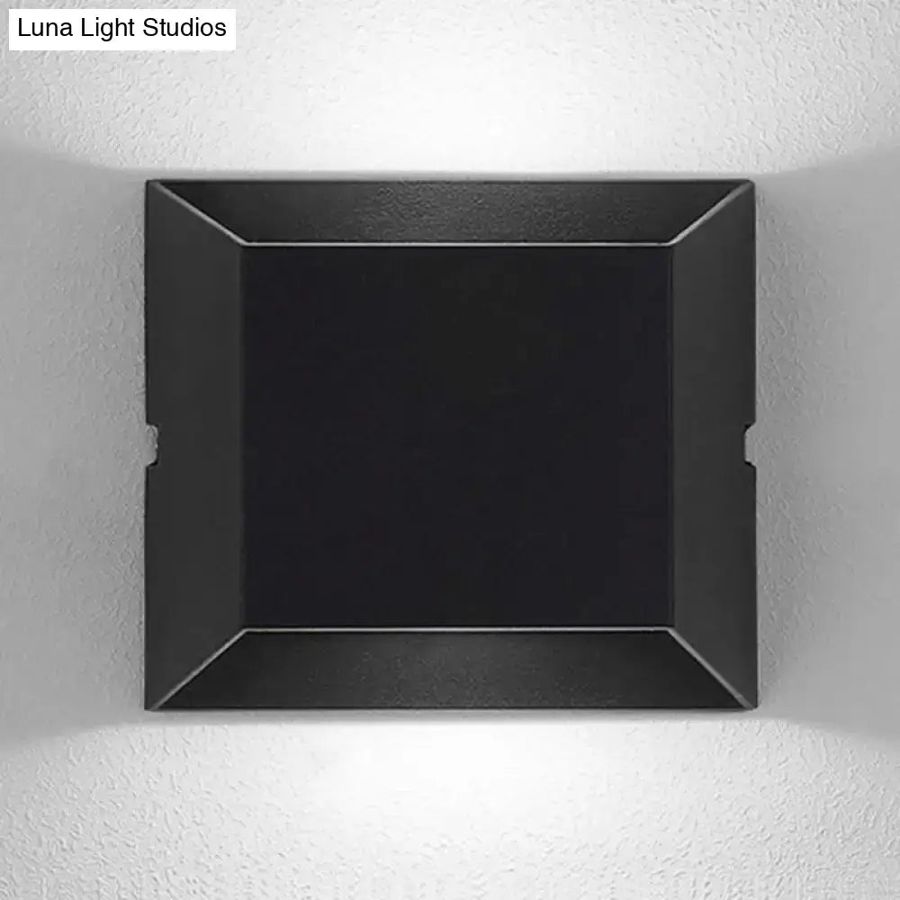 Modern matte black rectangular led wall sconce with angular design and matte finish for balcony outdoor lighting