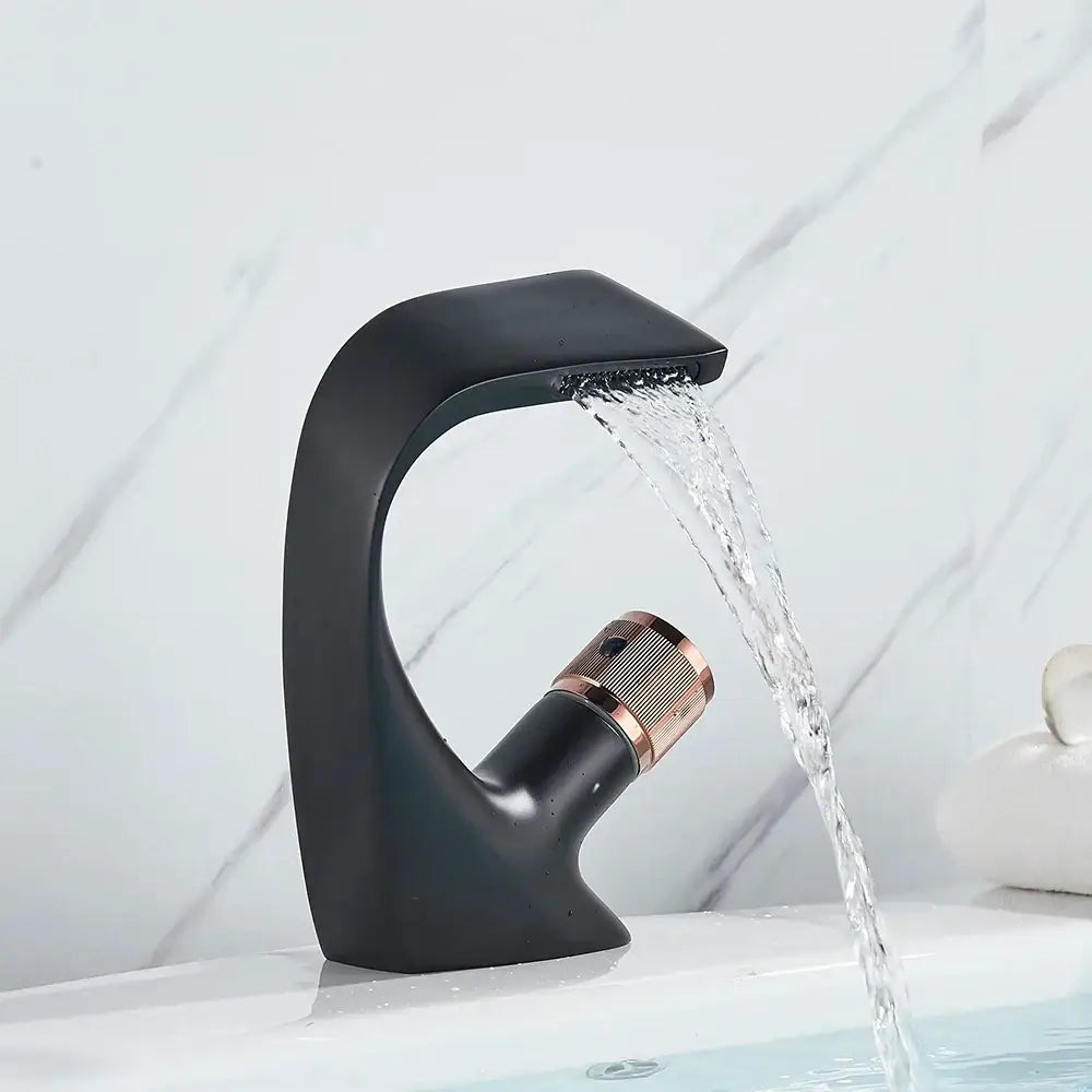 Modern matte black and rose gold brass basin faucet with waterfall spout and decorbites black brass handle design