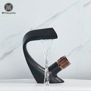 Modern matte black and rose gold brass basin faucet with waterfall spout and textured handle by myqualife black brass basin