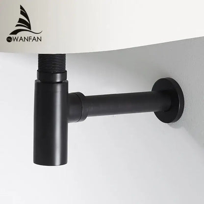 Modern matte black round bottle trap with pop up drain made of sleek matte-finish metal for under-sink use